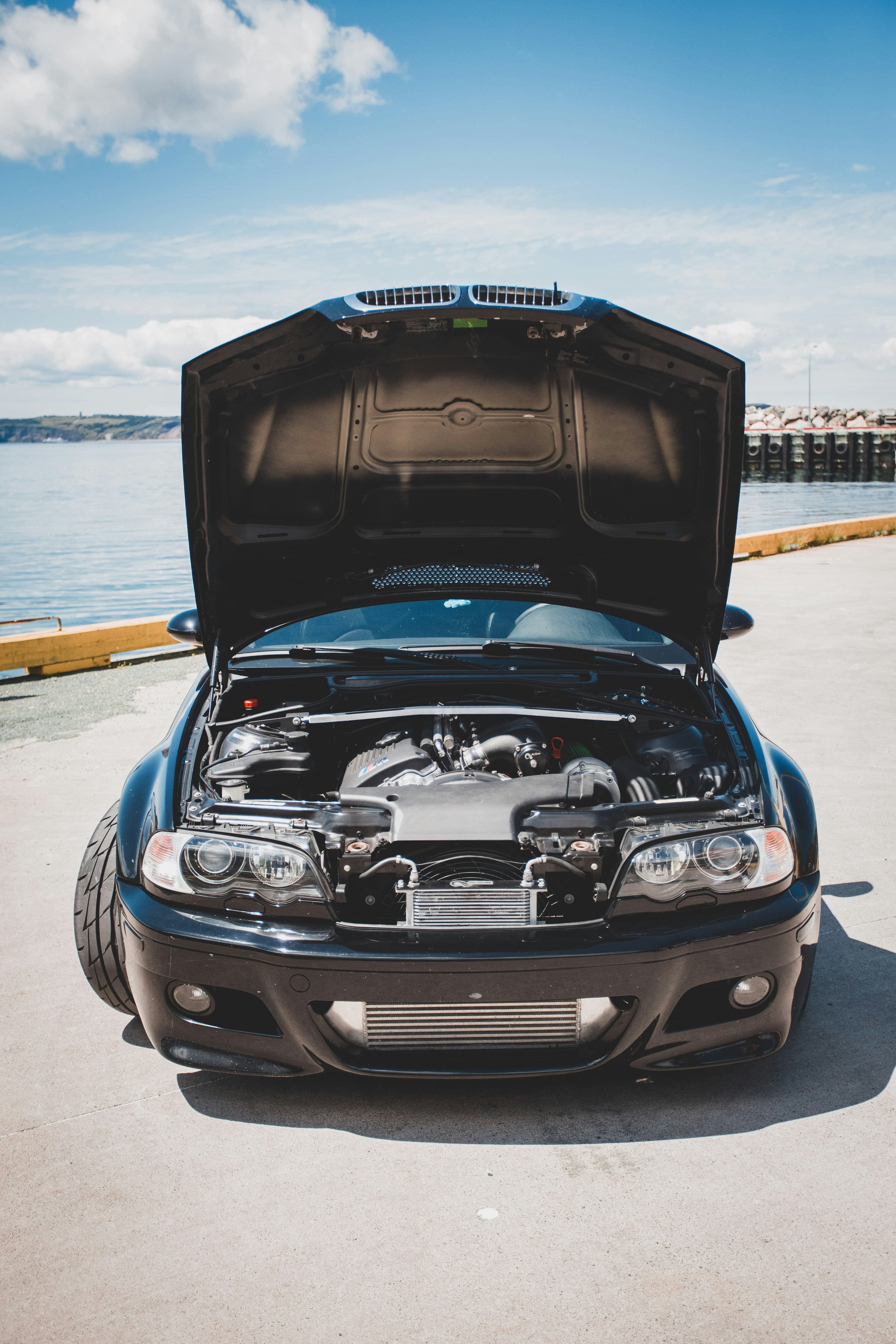 Car with the hood open waiting for a mobile mechanic